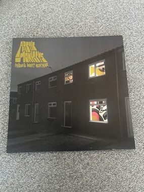 the Rolling Stones Black Album Cover with Yellow, Red, Pink and White Window Art